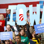 Iowa Democrats holding signs at Obama rally. Photo: Aaron Roeth Photography
