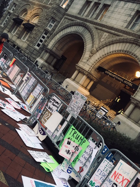 Protesters left their signs in front of the Trump-owned hotel in Washington D.C.