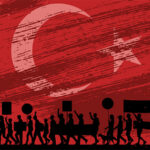 silhouetted image of marching protesters with signs in front of a full background image of the Turkey national flag