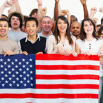 Group of people holding American flag