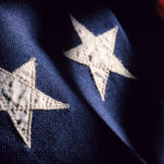 Close up of stars on American flag.